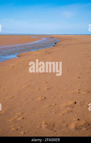 Sandstrand bei Ebbe, Port Carlisle, Cumbria, England Stockfoto