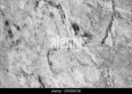 Grauer Marmorstein, nahtloses Muster, natürliche Materialstruktur mit Adern und Kratzern, Draufsicht Stockfoto