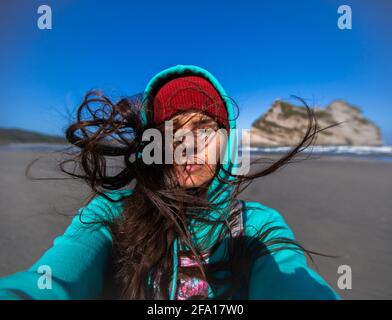 Windy Dat am Wharariki Beach Stockfoto