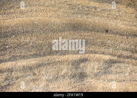 Sandstruktur Hintergrund vom Strand für einen Sommer-Stil Hintergrund Stockfoto