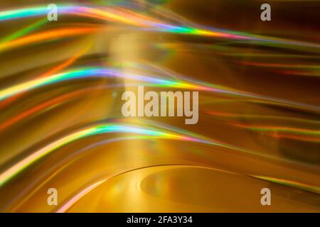 Unscharfer abstrakter holographischer Hintergrund. Futuristischer Retro-Style. Gold-Produktständer. Stockfoto