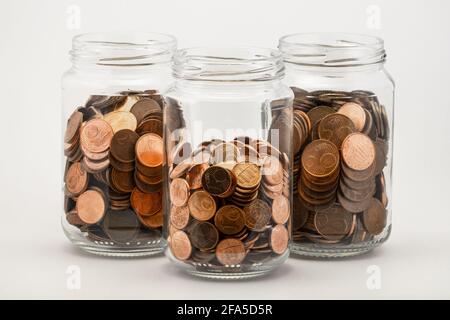 Eurocents im Glas. Stockfoto