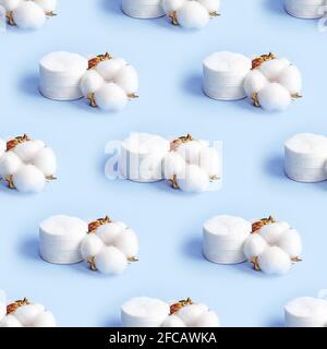 Weiße trockene Baumwollblumen und nahtlose Muster auf hellblauem Hintergrund. Stockfoto
