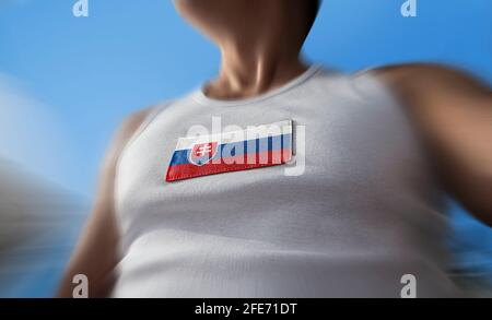 Die Nationalflagge der Slowakei auf der Brust des Athleten Stockfoto