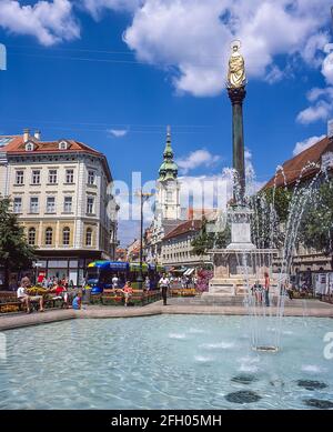 Bunte Straßenszene am Eisemenbrunnen in der Stadt Graz, Österreichs zweitgrößter Stadt im Bundesland Steiermark im Südosten Österreichs, nicht weit von der Grenze zu Slowenien. Stockfoto