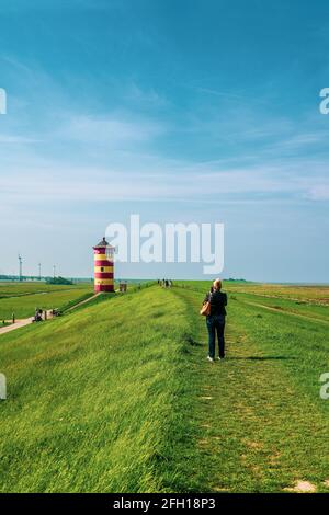 Panoramablick auf den Leuchtturm Pilsumer, Deutschland. Stockfoto