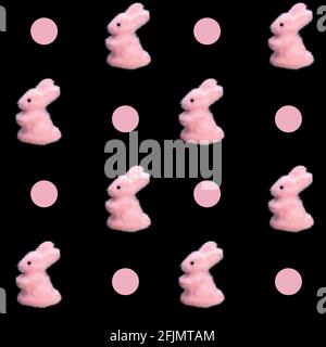 Nahtlose Muster von farbigen Kaninchen auf schwarzem Hintergrund isoliert. Hochwertige Fotos Stockfoto