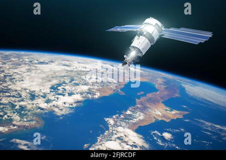 Forschung, Sondierung, Überwachung in der Atmosphäre. Kommunikationssatellit im Orbit über der Oberfläche des Planeten Erde. Elemente dieses Bildes furniss Stockfoto
