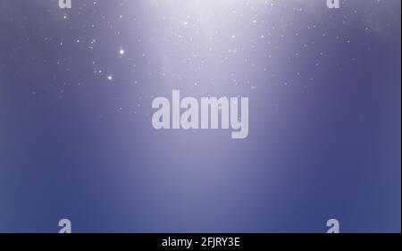 Abstrakter blauer Hintergrund. Weißes Bokeh oder Staub, Lichter auf blauem Hintergrund. Stockfoto