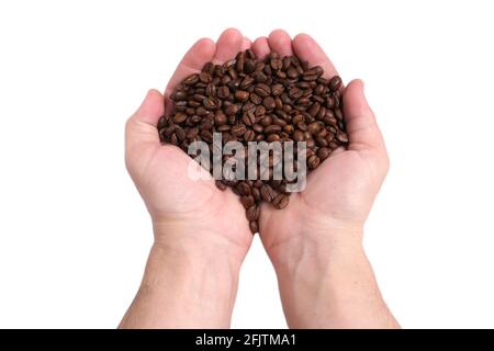 Eine Handvoll Kaffeebohnen in den Händen auf einem weißen Hintergrund von Isolate Stockfoto