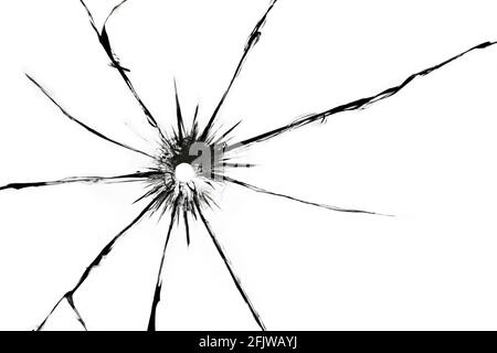Die Wirkung der Risse auf das zerbrochene Glas aus dem Schuss der Waffe. Ein Loch im Glas der Kugel. Stockfoto