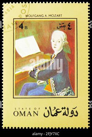 MOSKAU, RUSSLAND - 16. NOVEMBER 2019: Briefmarke gedruckt in Cinderellas (Oman) zeigt Mozart, Oman (State of) Serie, 4 - Omani baisa, um 1972 Stockfoto