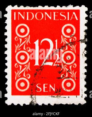 MOSKAU, RUSSLAND - 27. SEPTEMBER 2019: Die in Indonesien gedruckte Briefmarke zeigt Zahlen, Zahlenreihe, um 1949 Stockfoto