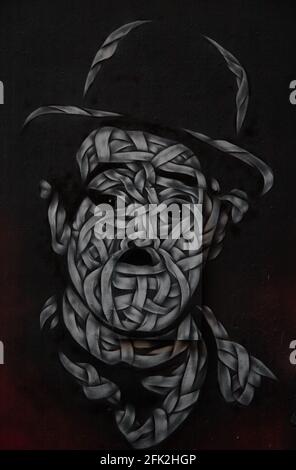 Charlie Chaplin Graffiti an einer Wand am Hackeschen Markt in Berlin. Künstler unbekannt. Charlie Chaplin Graffiti am Hackeschen Markt in Berlin. Stockfoto