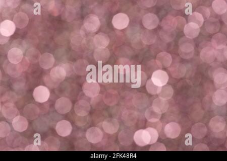 Abstrakt, weiches Rot, Rosa, Weinbokeh, defokussierte Hintergrundfarbe. Textur für Weihnachten und Neujahrskonzerte. Stockfoto