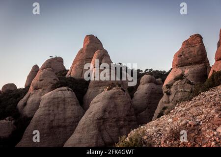 Sonnenuntergang von der Spitze eines Berges von Montserrat Bergkette Stockfoto