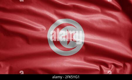 Tunesische Flagge winkt im Wind. Nahaufnahme von Tunesien Banner weht, weiche und glatte Seide. Stoff Stoff Textur Fähnrich Hintergrund. Stockfoto