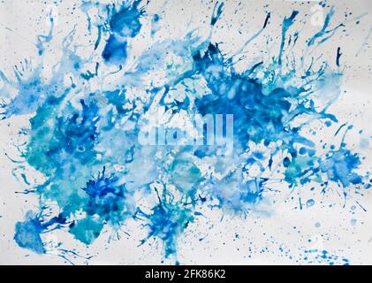 Blaue Farbspritzer auf Papier. Blaue Farbspritzer auf Papier. Stockfoto