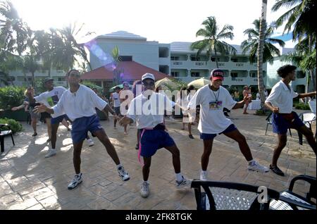 Dominikanische Republik, Animateure in der Hotelanlage Caribbean Villages, Playa Dorada. Bavaro District Stockfoto