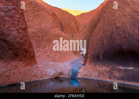 Mutitjulu Wasserloch am Uluru Stockfoto