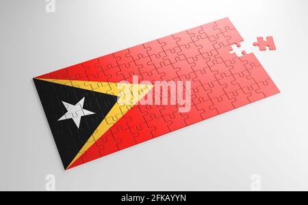 Ein Puzzle mit einem Druck der Flagge von Timor Leste, Teile des Puzzles auf weißem Hintergrund isoliert. Erfüllung und Perfektion Konzept. Symbol Stockfoto