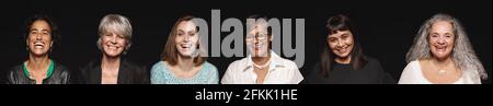 Nahaufnahme von glücklichen Frauen mittleren Alters und reifen Frauen in Weitwinkelstellung. Gruppe von Frauen auf schwarzem Hintergrund. Stockfoto