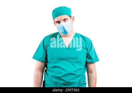 Müder Arzt in einer Mütze und einer Maske. Stockfoto
