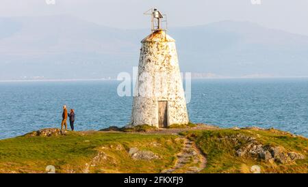 Ynys Llanddwyn,Llanddwyn, Llanddwyn Island,Anglessey,Anglesey,Ynys Mon,Insel Anglesey,Insel,Küste,Küste,Küstenweg,Isle of Anglesey Küstenweg,Nord,Wales,Walisisch,GB,Großbritannien,Großbritannien,Großbritannien,Vereinigtes Königreich,Europa.Ynys Llanddwyn ist eine kleine Gezeiteninsel vor der Westküste von Anglesey Wales (Nordwesten von Wales). Môn Die nächste Siedlung ist das Dorf Newborough.die Insel ist geologisch interessant mit Kissenlava, Jaspisformationen und äolischen Sandvorkommen. Die Insel ist Teil des National Nature Reserve of Newborough Warren.der Leuchtturm Tŵr Mawr markiert den Westen Stockfoto