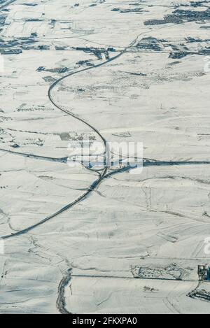 Ebenen Olivenbaum Schnee Madrid leere Straßen Luftbild Stadt Kreuzung Stockfoto