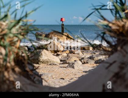 Strandhütten in Mudespit am Hengitsbury Head, Dorset Stockfoto