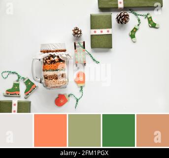 Farbabgleichspalette. Zero Waste Weihnachtsgeschenk in einem Glas. Geschichtete Bohnenmischung mit Gewürzen auf weißem Hintergrund ohne Kunststoff Holz Winter Xmas Stockfoto