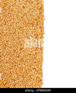 Hintergrund Textur von gerösteten goldenen Leinsamen oder Leinsamen mit gesunden Omega-3-Fettsäuren, Ballaststoffe, reich an Ölen und verwendet, um Cholesterin zu senken Stockfoto