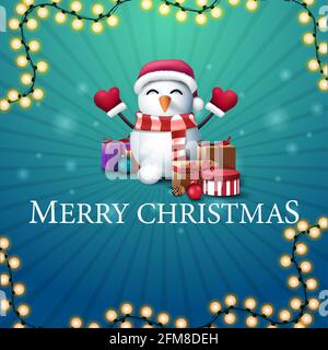 Frohe Weihnachten, blaue quadratische Postkarte im minimalistischen Stil mit Girlande und Schneemann in Weihnachtsmannhut mit Geschenken Stockfoto