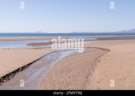Ebbe am Harlech Beach, Gwynedd, Wales Stockfoto