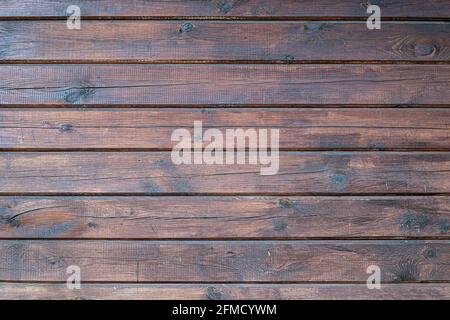 Nahaufnahme der Wand aus Holzbohlen. Stockfoto