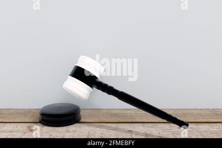 Richtergavel in weiß und schwarz auf Holzboden. 3d-Rendering Stockfoto