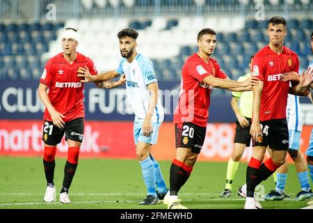 (L bis R) Antonio Raillo, Juande Rivas, Aleksandar Sedlar und Martin Valjent in Aktion während des Spiels von Malaga CF gegen RCD Mallorca der La Liga Smartbank 2020/21 im La Rosaleda Stadium.(Endstand; Malaga CF 1:1 RCD Mallorca) (Foto von Jose Antonio Carmona / SOPA Images/Sipa USA) Stockfoto