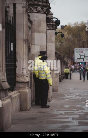Westminster, London - 2021.05.08: Polizisten bei einem marsch in London, um Veteranen zu unterstützen. Stockfoto