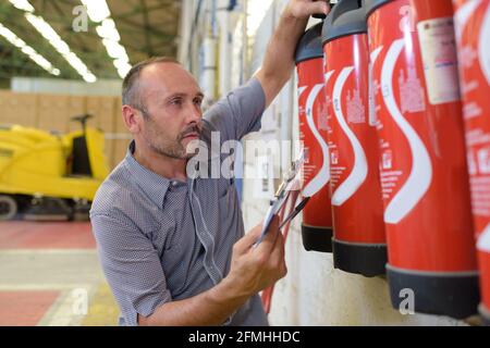 Feuerlöscher im Werk Stockfoto