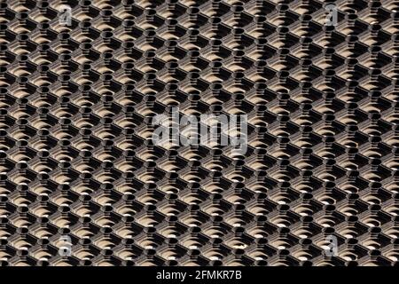 Struktur und Hintergrund der verwendeten staubigen Zellkautschuk-Bodenmatte - ausgerichtete perspektivische Ansicht Stockfoto