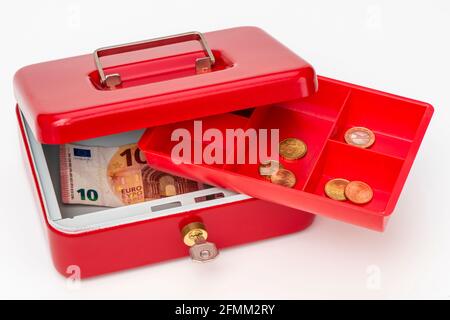 Geldkassette mit wenig Geld Stockfoto