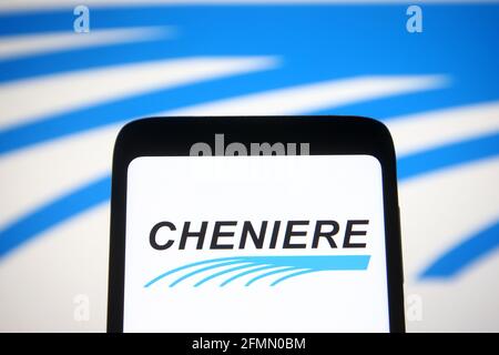 Ukraine. Mai 2021. In dieser Abbildung ist das Cheniere Energy Logo auf einem Smartphone und einem pc-Bildschirm zu sehen. (Foto von Pavlo Gonchar/SOPA Images/Sipa USA) Quelle: SIPA USA/Alamy Live News Stockfoto