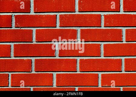 Ein Vollformatbild einer roten Ziegelwand Stockfoto