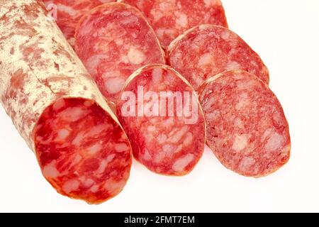 weisse Salami Wurst auf weißem Hintergrund Stockfoto