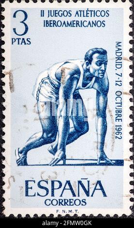 SPANIEN - UM 1962: Briefmarke gedruckt von Spanien, zeigt Läufer bei Iberoamerikanischen Sportspielen, um 1962 Stockfoto