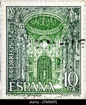 SPANIEN - UM 1979: Abgesagte Briefmarke gedruckt von Spanien, die das Kloster La Cartuja in Granada zeigt Stockfoto