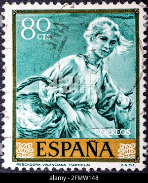 SPANIEN - UM 1964: Briefmarke gedruckt von Spanien, zeigt Fischerin von Valencia von Joaquin Sorolla, um 1964 Stockfoto