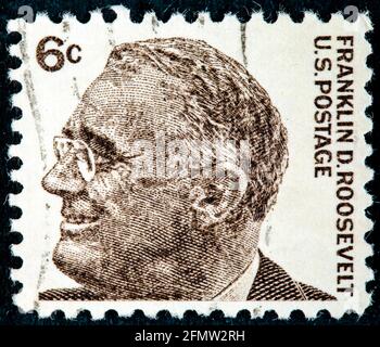 USA-UM 1966: Eine Briefmarke zeigt Bildportrait von Franklin D. Roosevelt, dem 37. Präsidenten der Vereinigten Staaten von Amerika, um 1966. Stockfoto
