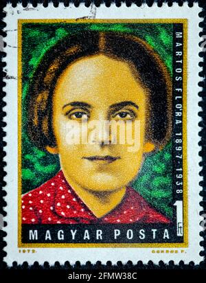 UNGARN - UM 1972: Eine in Ungarn gedruckte Briefmarke zeigt Flora Martos, die Vorsitzende der ungarischen Arbeiterpartei um 1972 Stockfoto