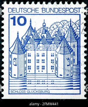 Deutschland - um 1977: In der Bundesrepublik Deutschland gedruckte Briefmarke mit dem Bild der Glucksburg, um 1977. Stockfoto